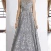 Janique - 85124 Illusion Lace Appliqued Geometric Gown In Grey 2 Janique - 85124 Illusion Lace Appliqued Geometric Gown In Grey